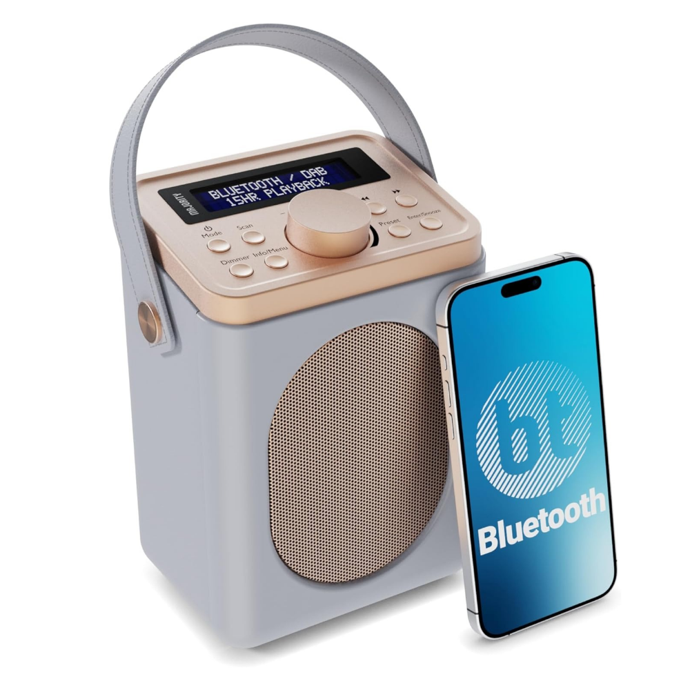 Grey portable digital radio with carry handle, beige top panel, and round speaker grille