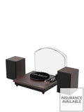 Brown wooden turntable with black platter and dust cover, plus two box speakers