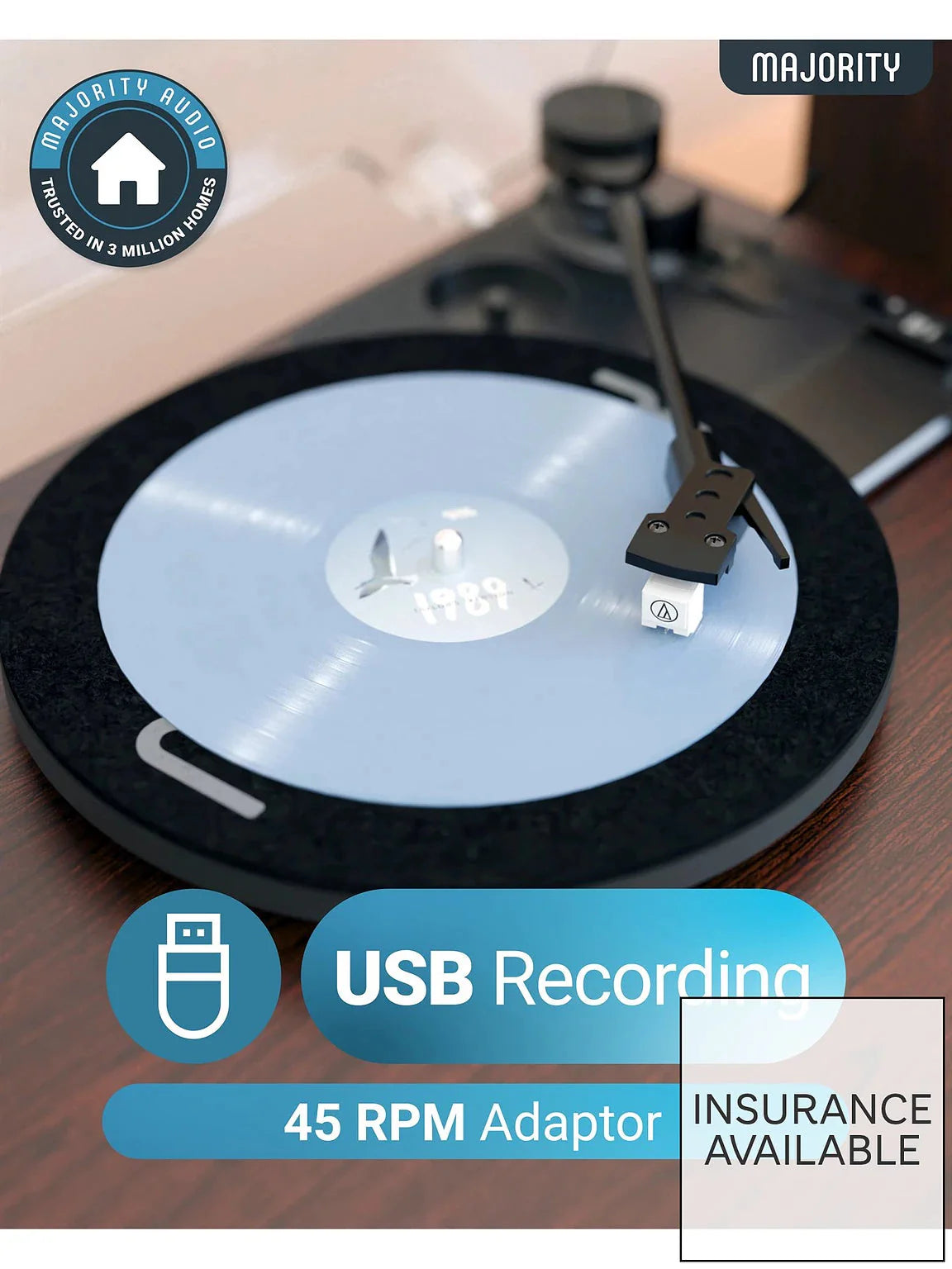 Turntable with vinyl record and USB recording adaptor near tonearm