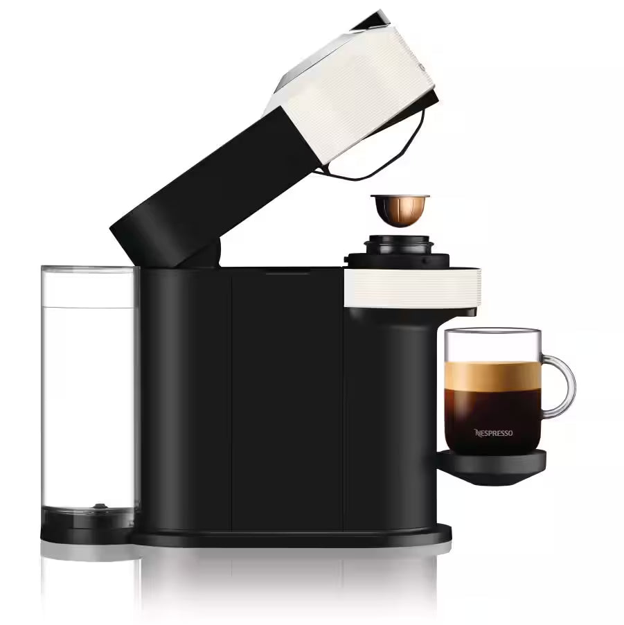 Nespresso Vertuo Next coffee machine with milk frother, black base, cup with crema
