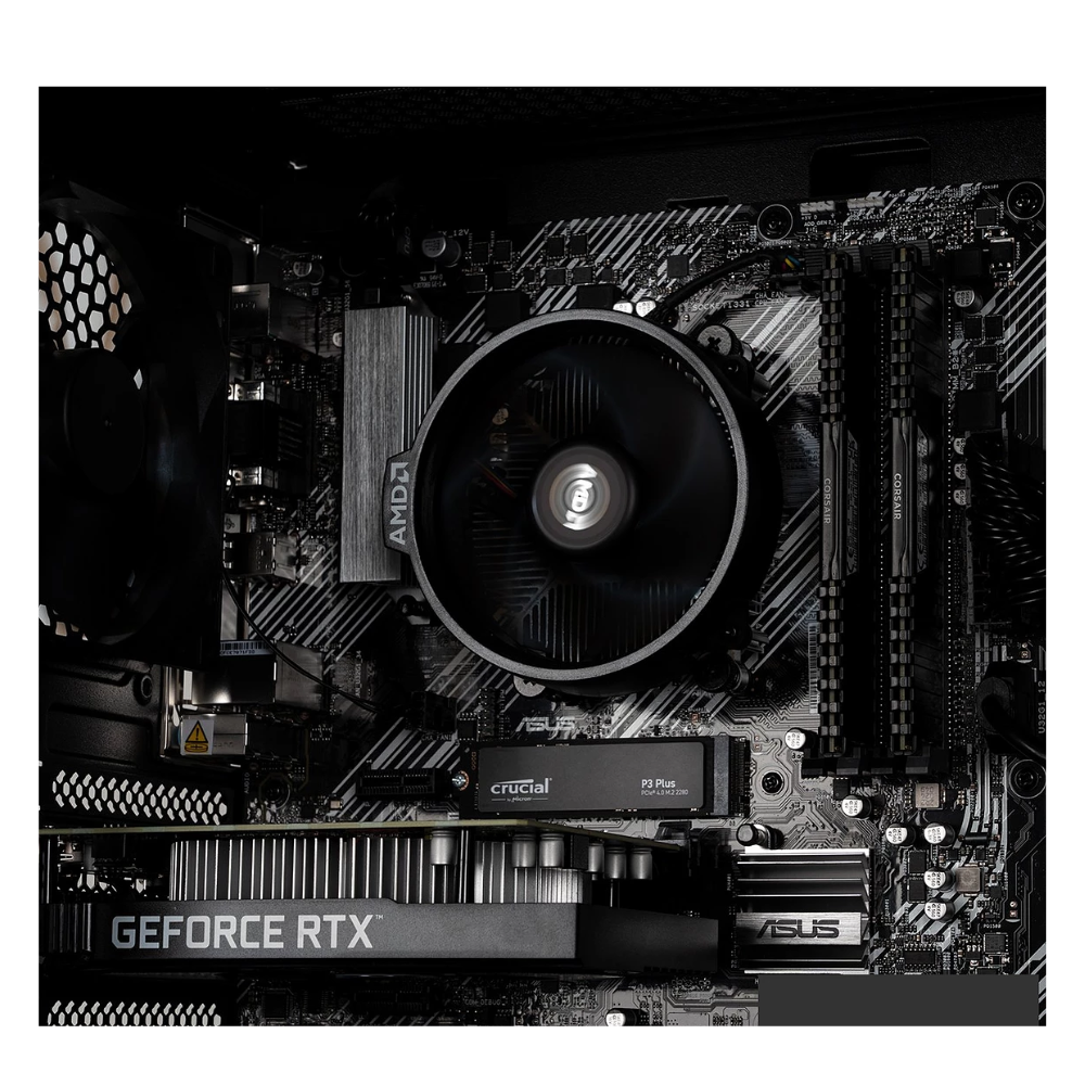 Motherboard close-up with GeForce RTX graphics card fan and RAM slots