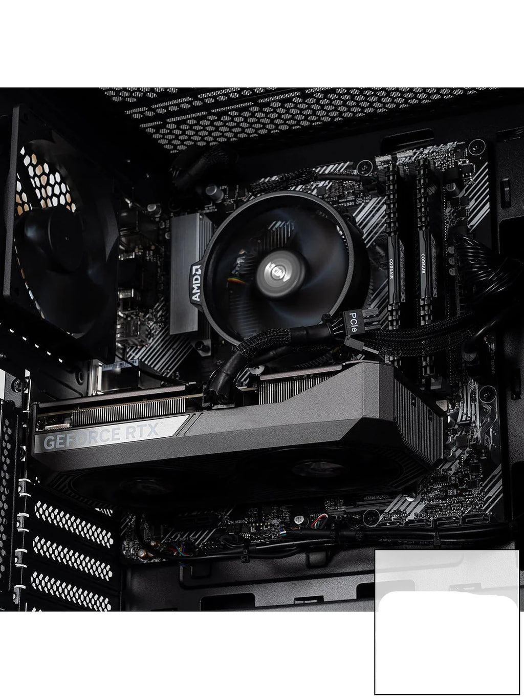 Gaming PC with open case showing GPU and cooling fans