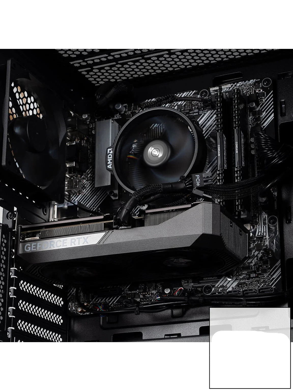 Gaming PC with open case showing GPU and cooling fans