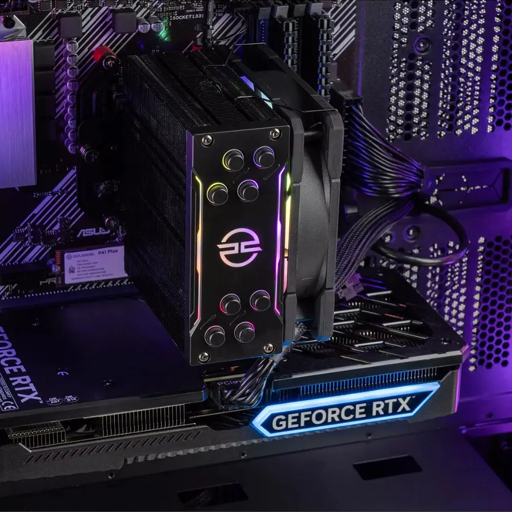 Close-up of RGB CPU cooler and GeForce RTX graphics card inside PC