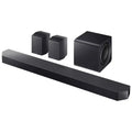 Black soundbar with subwoofer and rear cube speakers