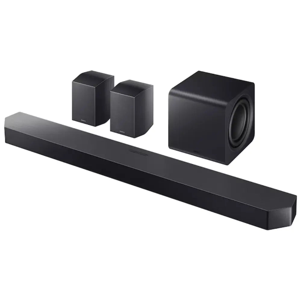 Black soundbar with subwoofer and rear cube speakers