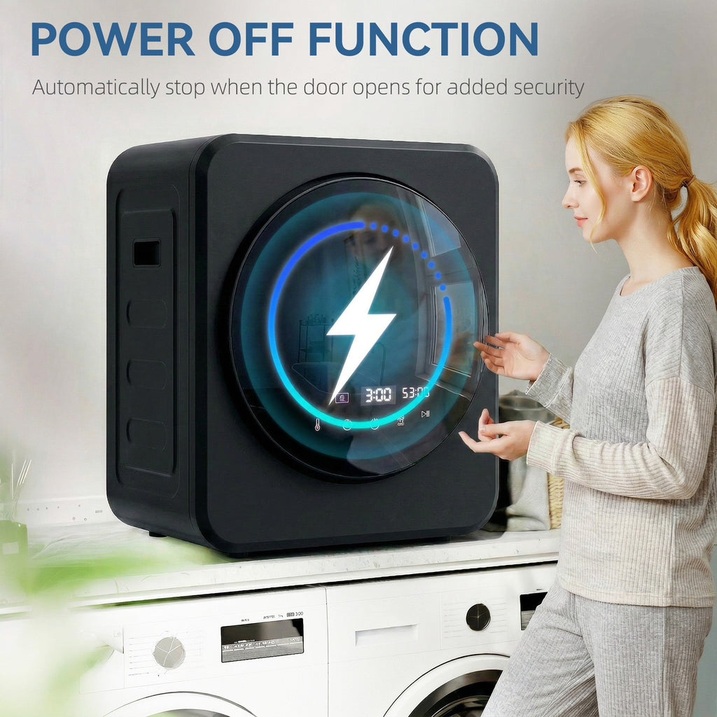 Black tumble dryer with glowing power icon on the circular door glass