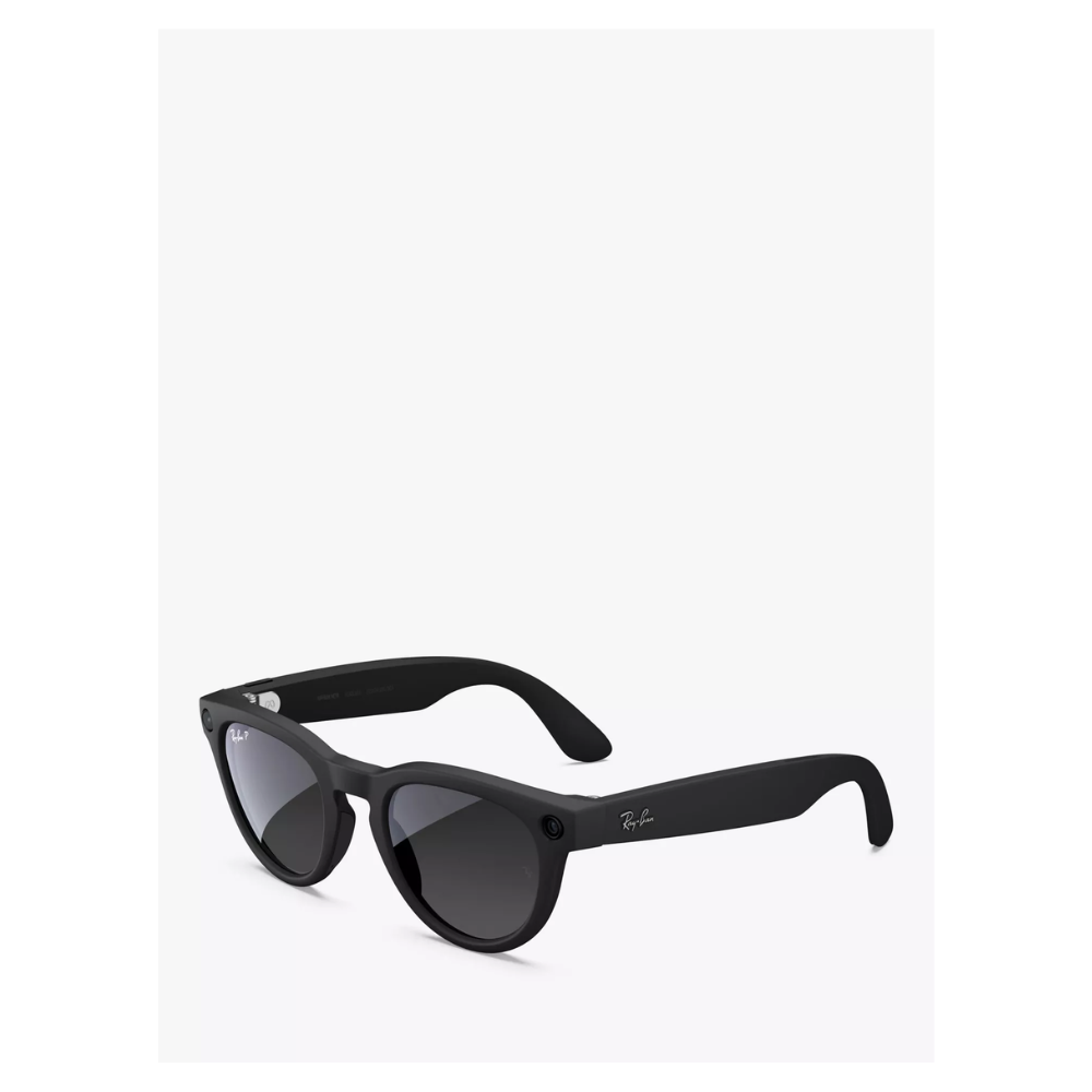 Matte black sunglasses, side profile with curved temple and dark tinted lenses.