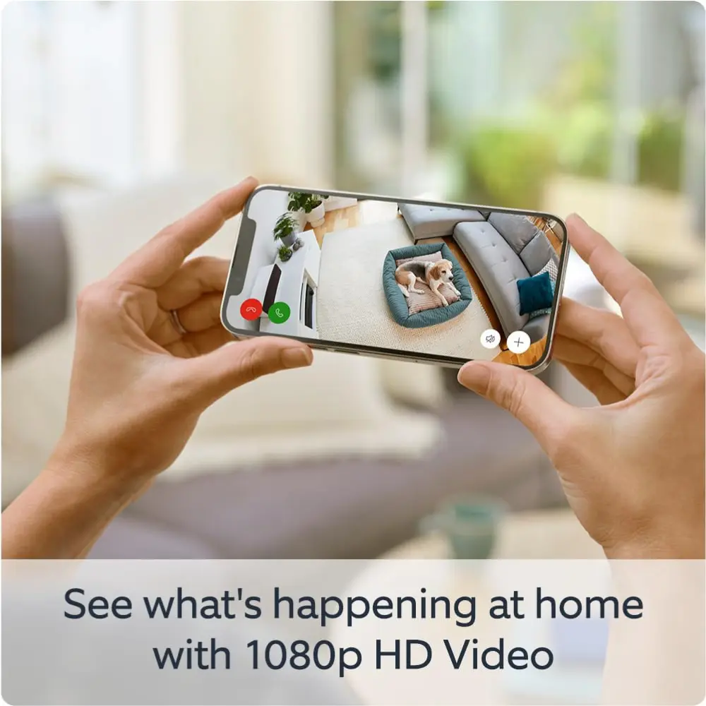 Mobile app control for indoor security camera video, hands holding a smartphone