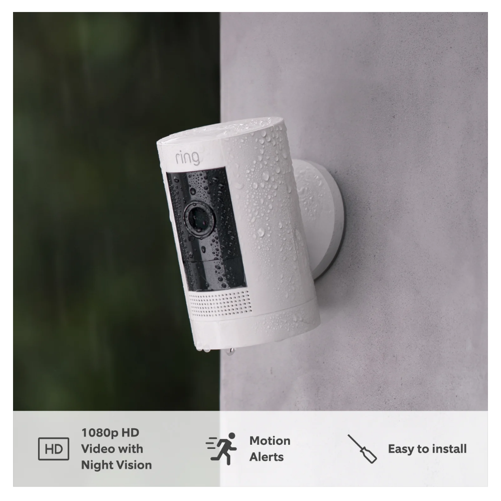 Outdoor security camera with black lens panel, mounted on wall in white