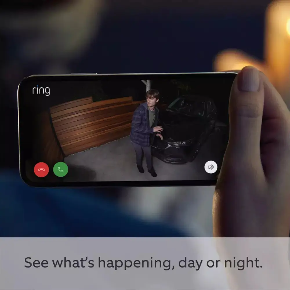 Smartphone live view of Ring security camera at night with playback controls