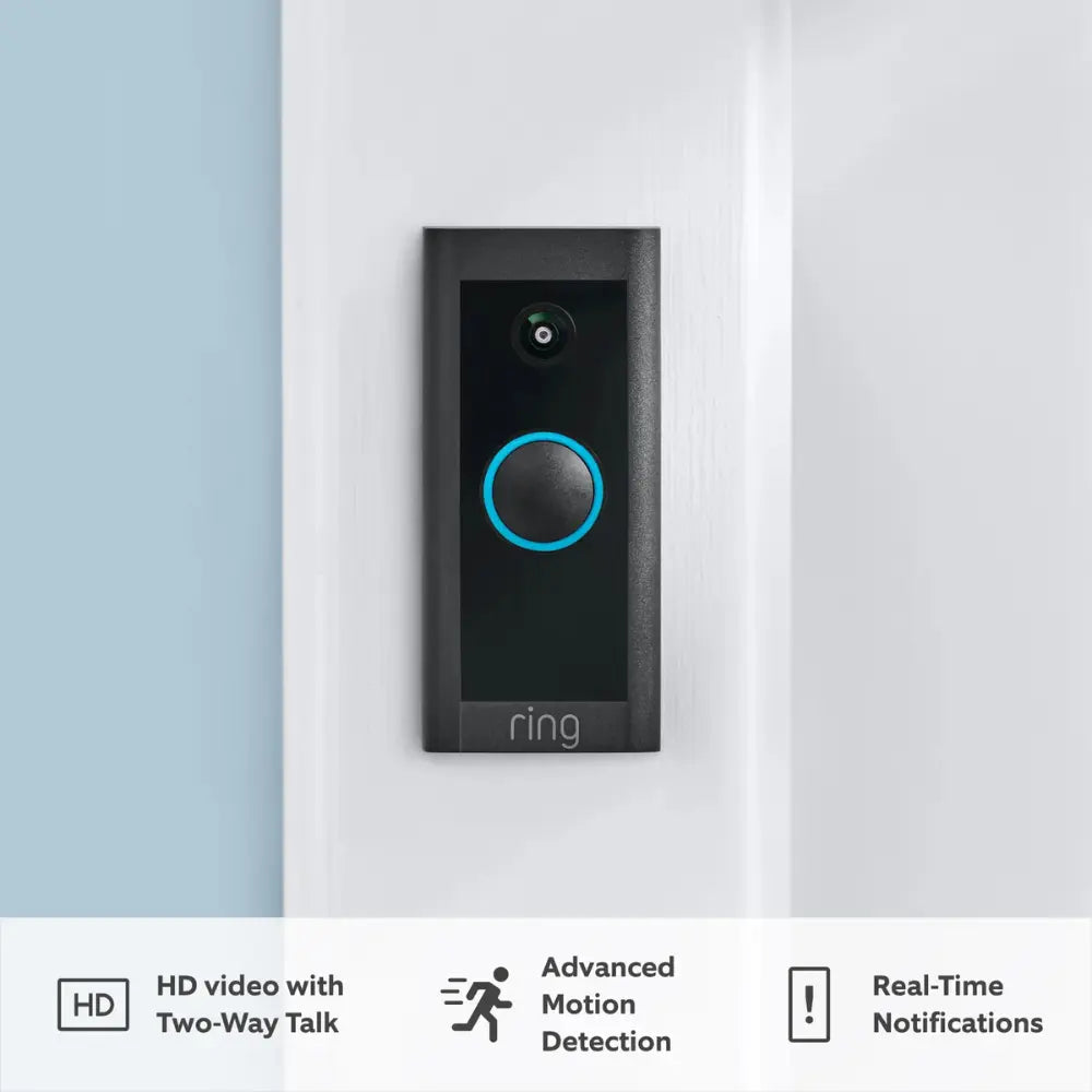 Dark gray video doorbell mounted on wall with blue ring light and camera