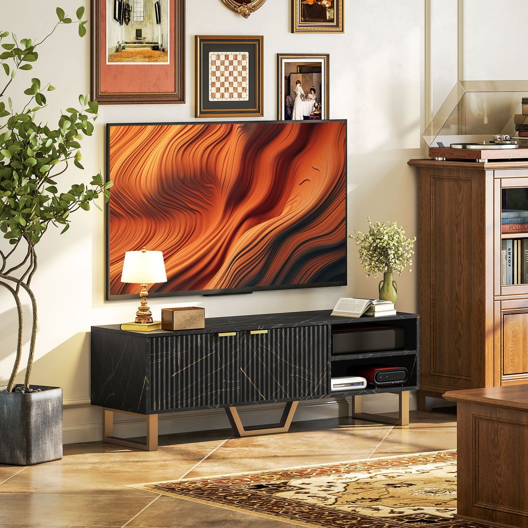 Black TV stand cabinet with two fluted doors and open media shelf, gold accent handles