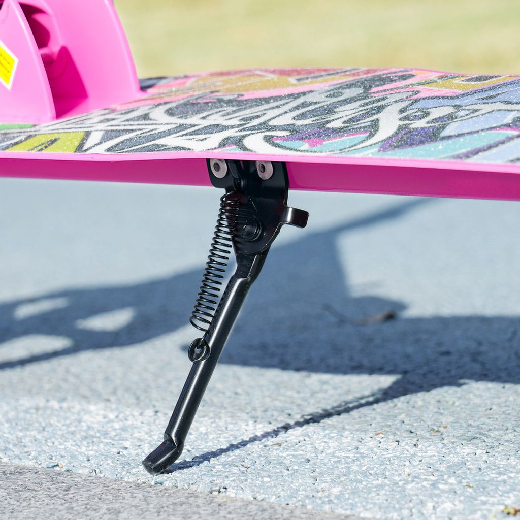 Pink scooter center kickstand and spring leg attached under the deck