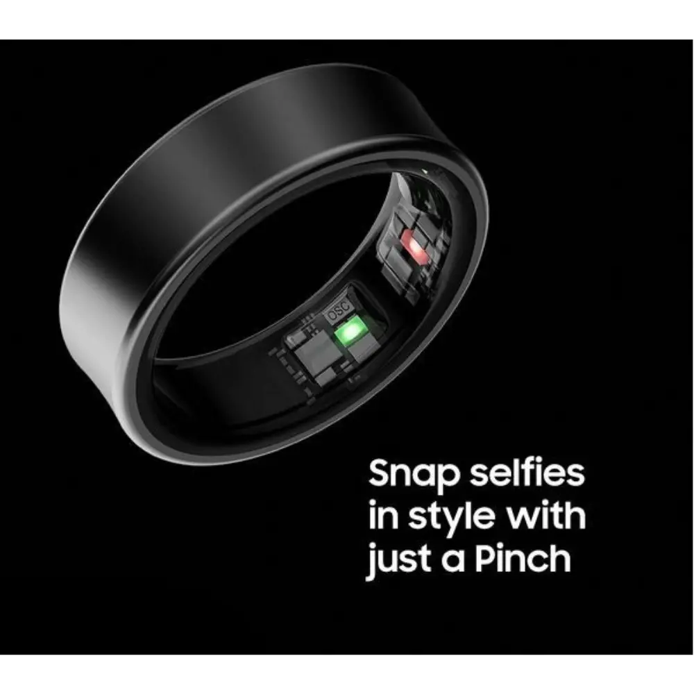 Matte black smart ring close-up with glowing status light inside