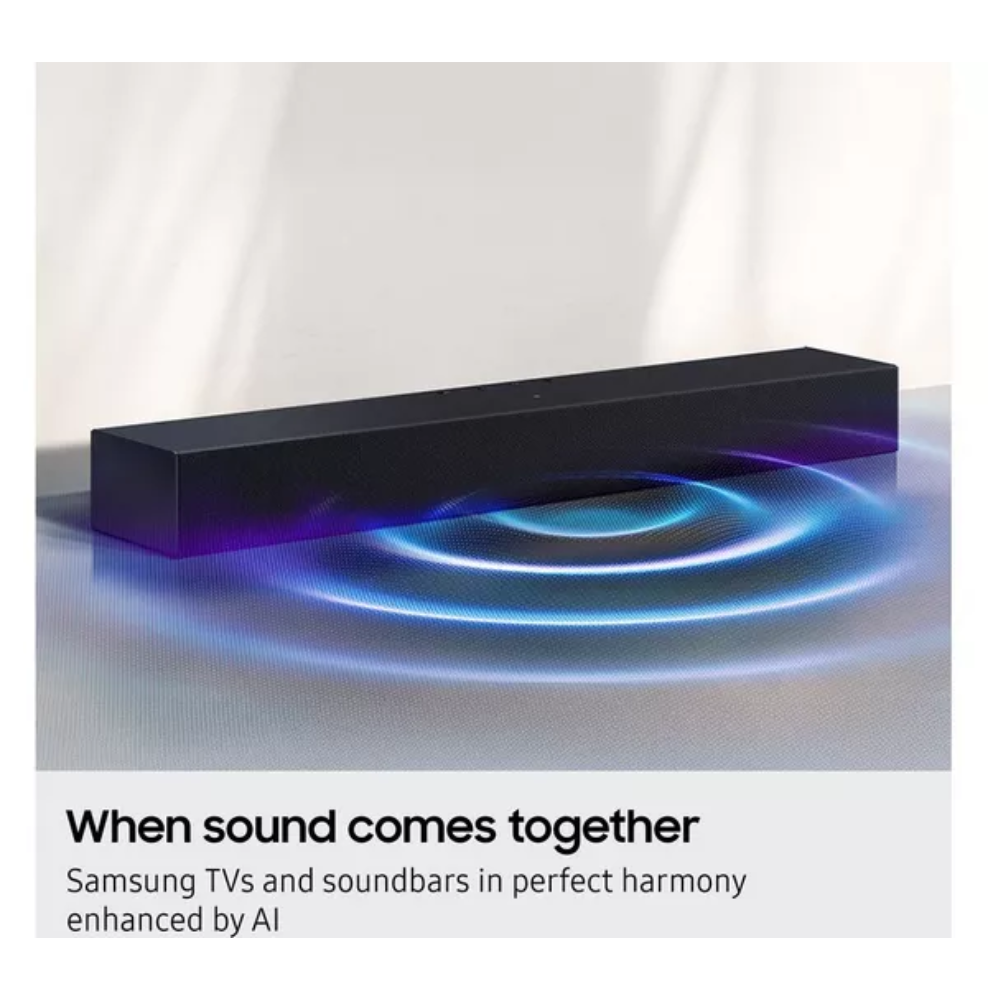 Black sound bar projecting blue surround sound wave light