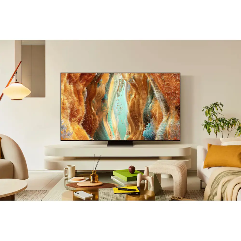 Neo QLED 4K TV on media console with colorful scenic artwork on screen