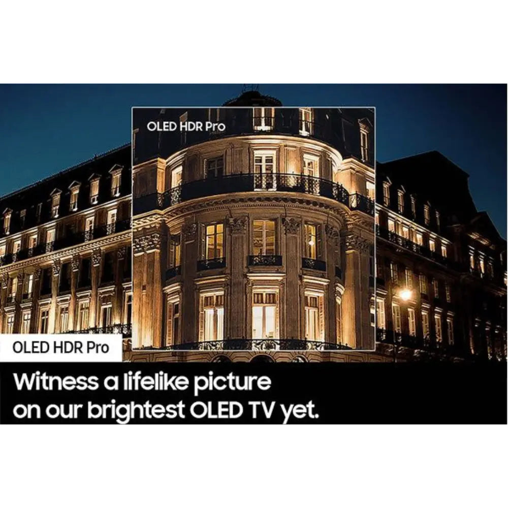 OLED smart TV showing a nighttime building scene with high-contrast colors
