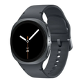 Graphite smartwatch with dark round display and orange-accent hands; black silicone band