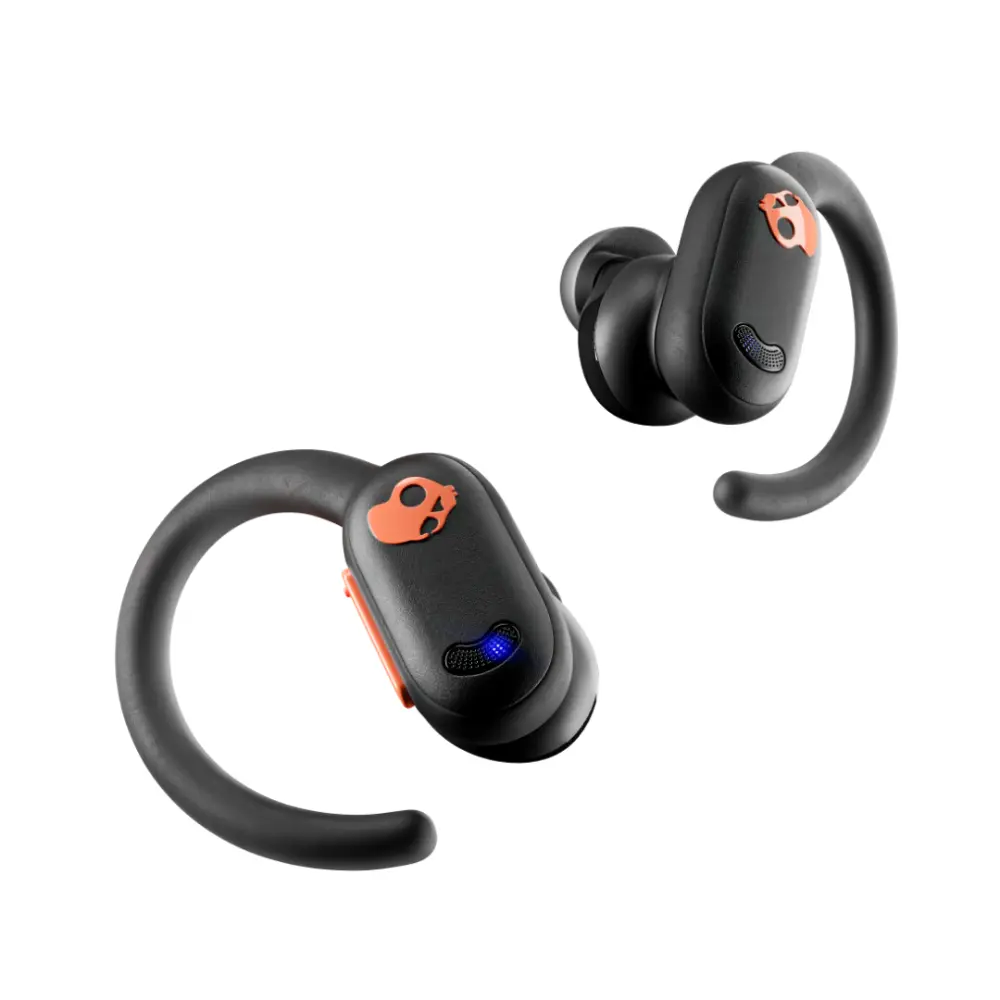 Pair of black wireless earbuds with orange ear tips and charging contacts