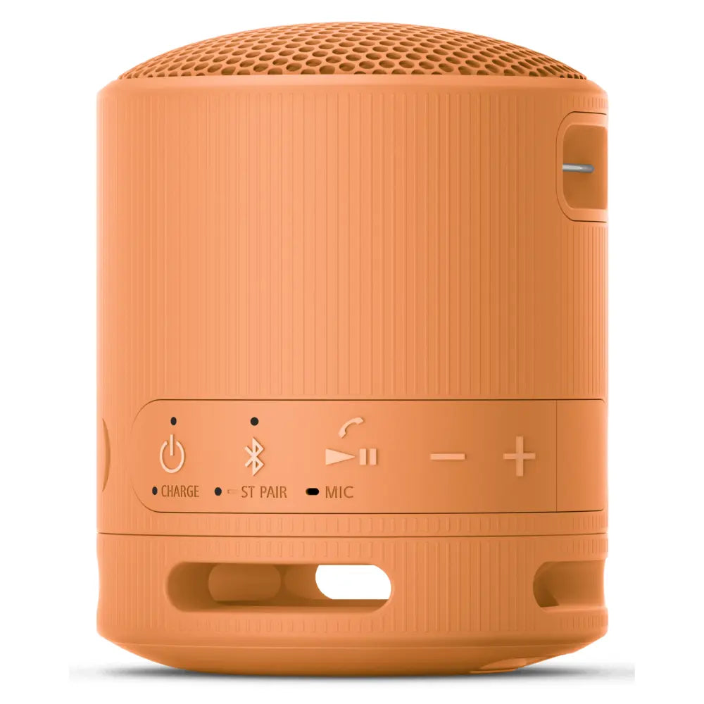Orange SONY wireless Bluetooth speaker close-up of controls and charging area