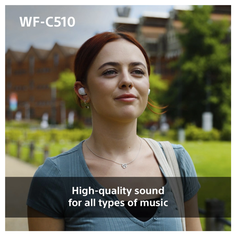 White wireless earbuds in ear, compact in-ear design