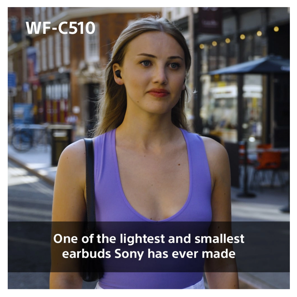 White wireless earbuds in ear, sleek compact in-ear design