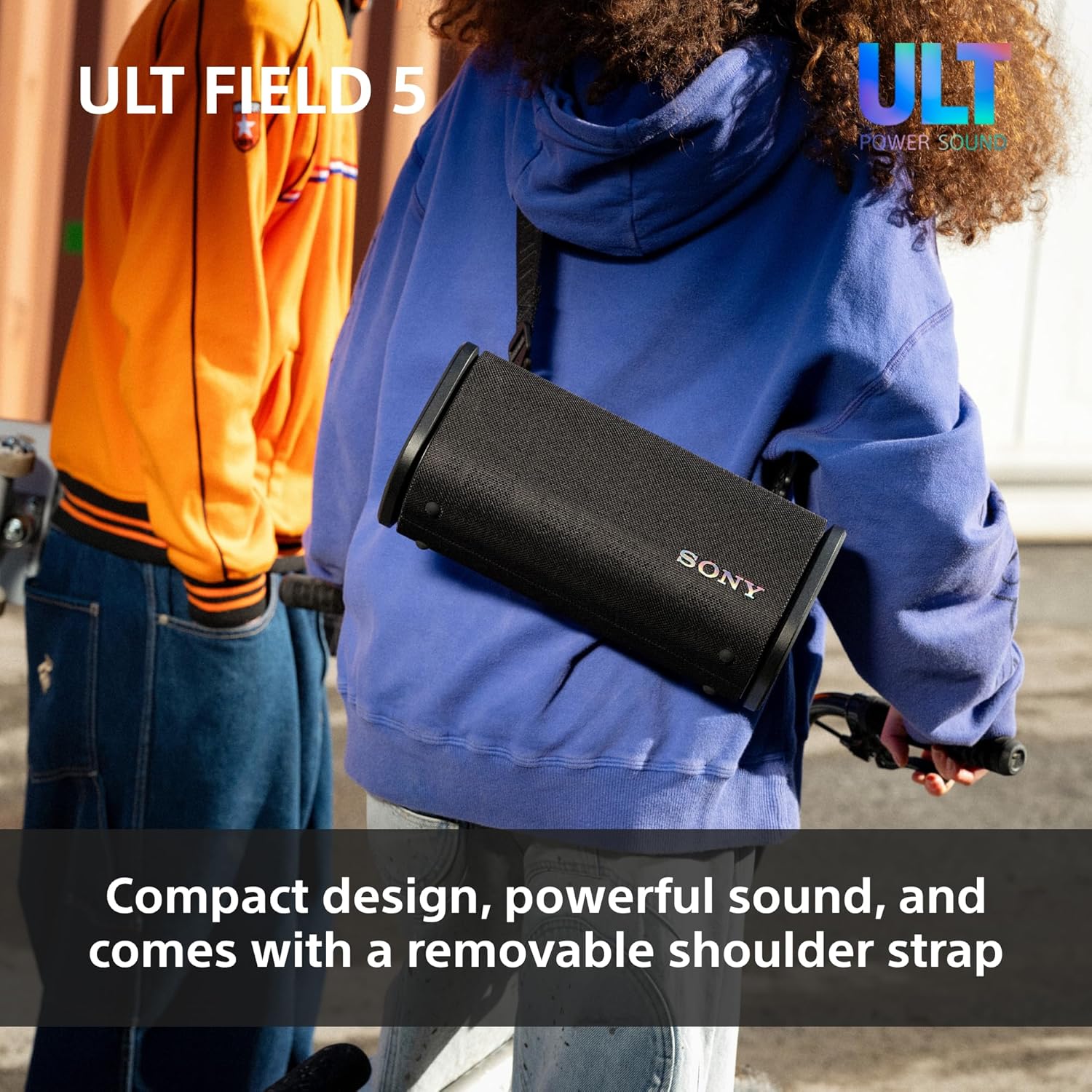 Black SONY portable speaker with removable shoulder strap and compact cylindrical shape.