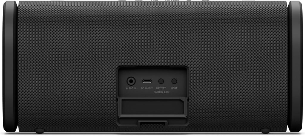Black wireless portable speaker back panel with port cover and strap mount