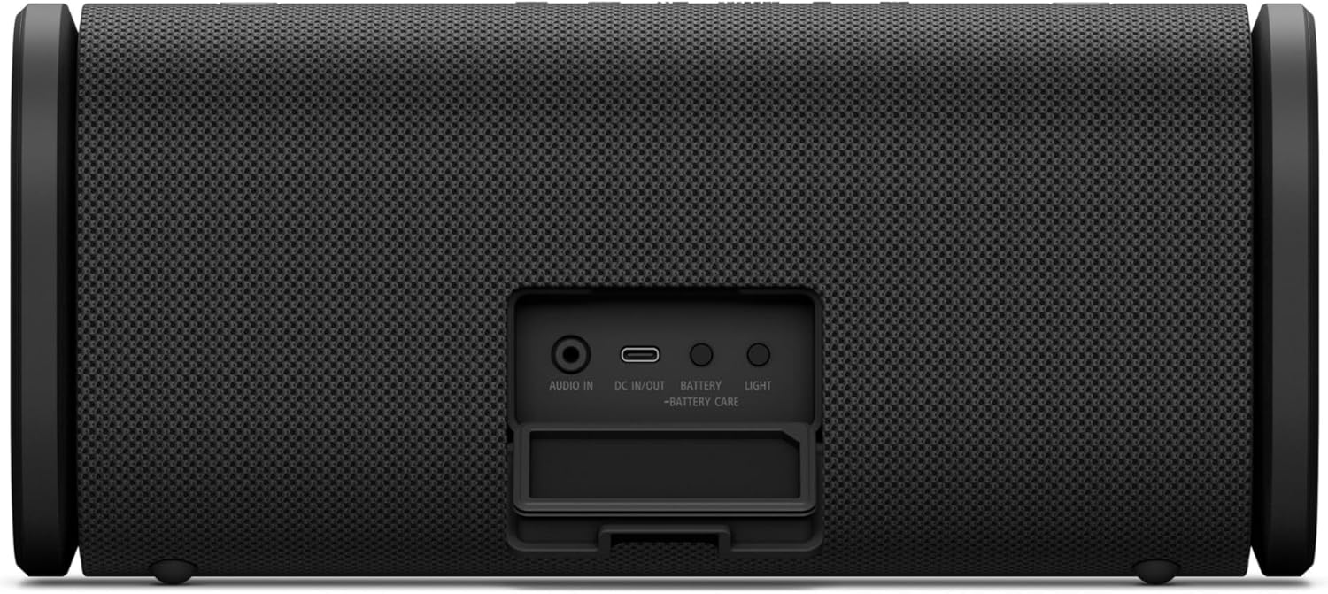 Black wireless portable speaker back panel with port cover and strap mount