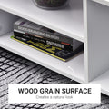 White 3-tier TV stand bookshelf with open shelves and books on the middle level