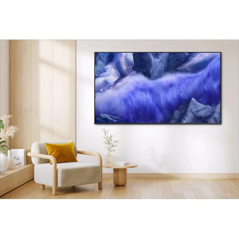 Wall-mounted Samsung QLED 4K TV showing blue abstract screen