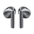 Silver in-ear earbuds with black speaker grilles and glossy charging contacts