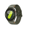 Green 44mm smartwatch with round black display and dark green silicone sport band.