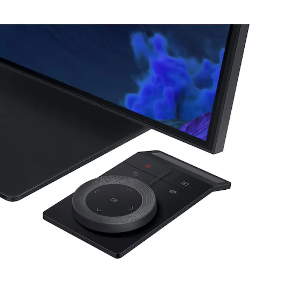 Curved gaming monitor with control puck and buttons on the lower front bezel.