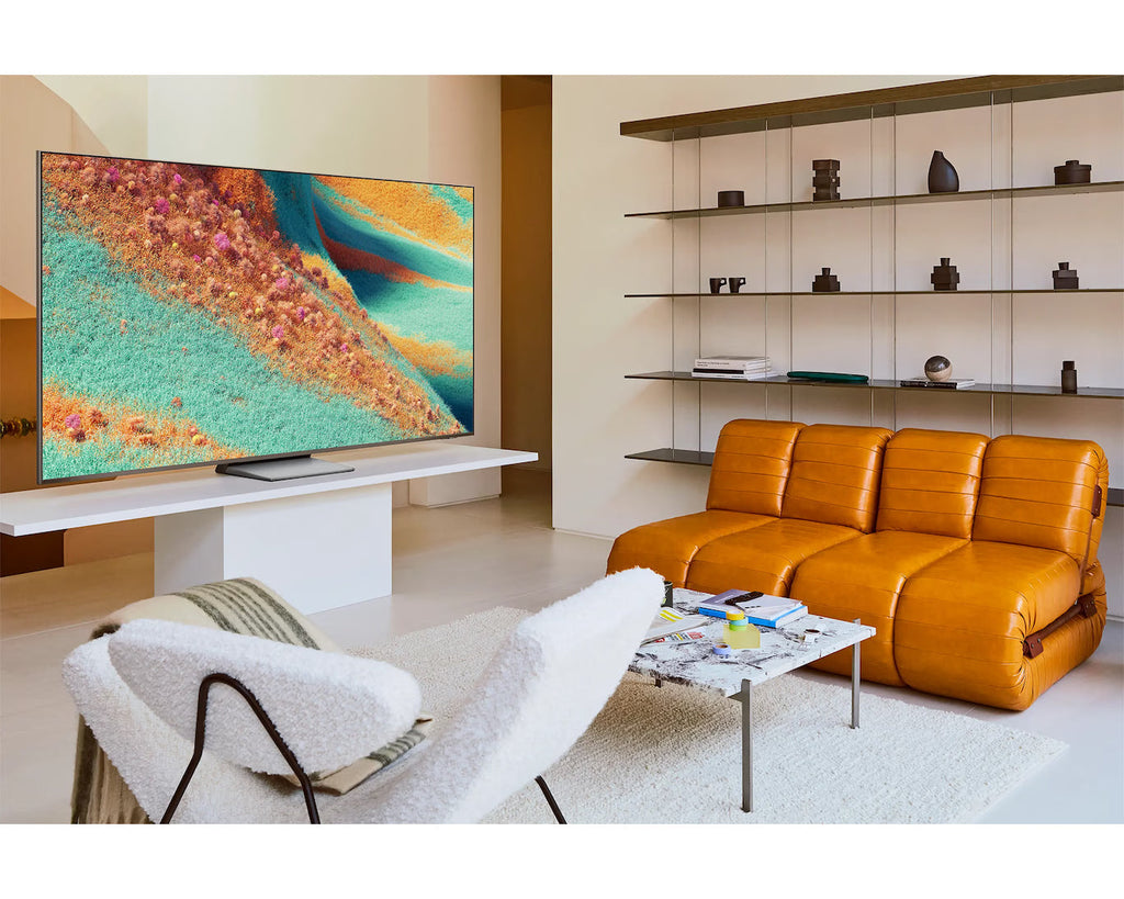 Samsung 55-inch 4K Mini LED smart TV on stand in a living room