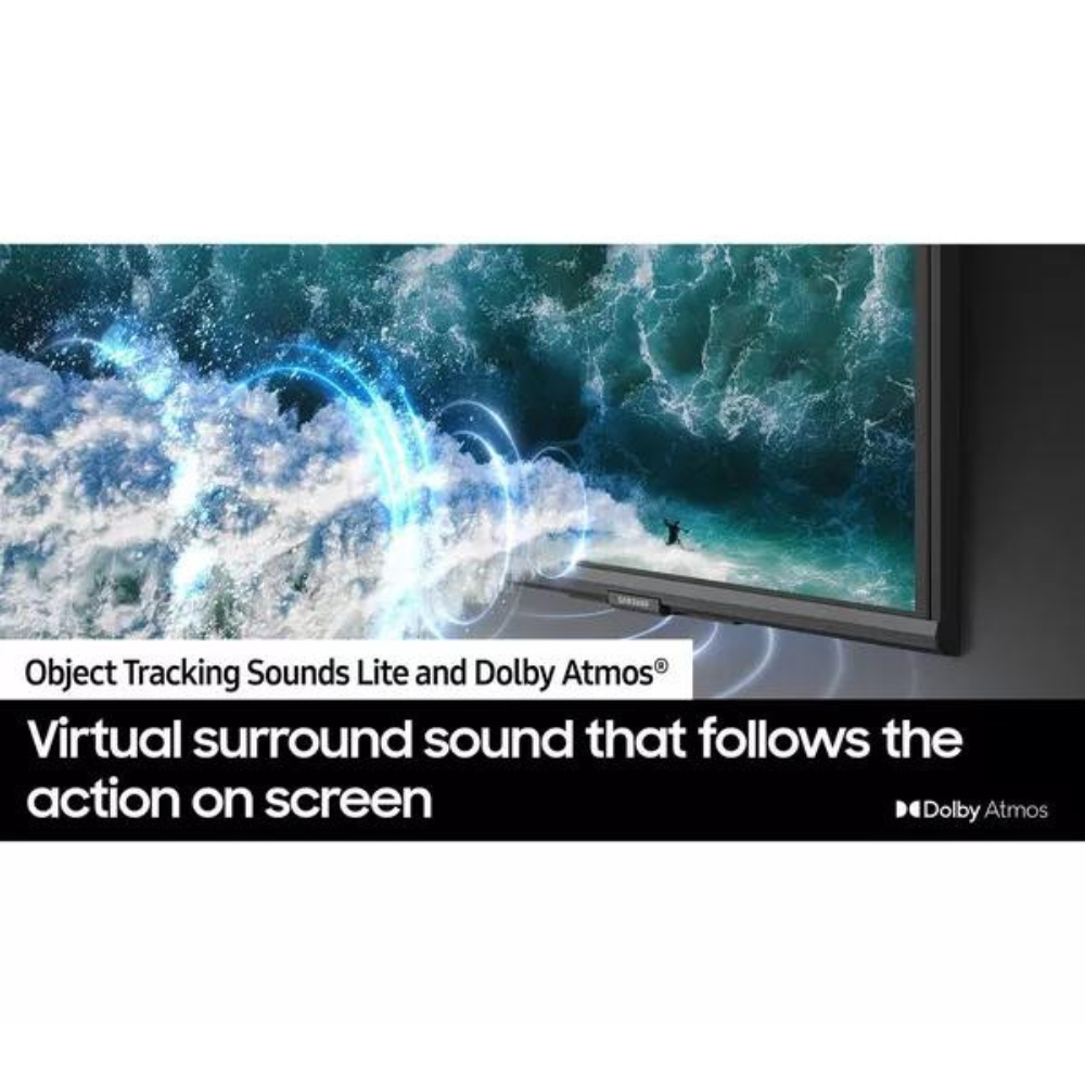 OLED smart TV with thin black frame, displaying ocean wave scene with bright glow effects
