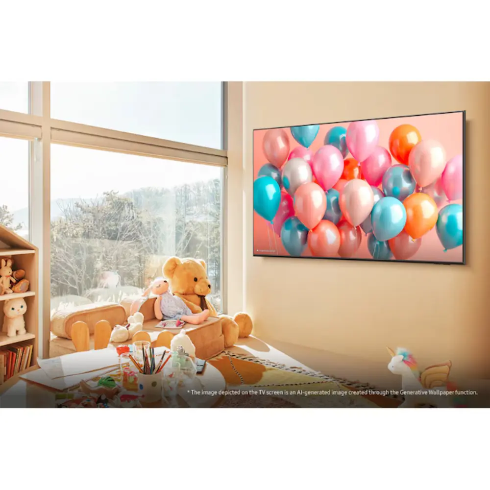 Flat-screen QLED TV showing colorful balloons on a wall-mounted display