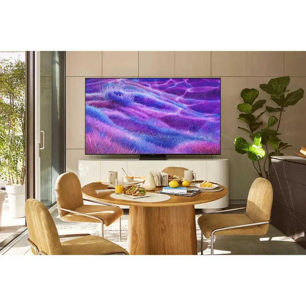 Samsung TV with vibrant purple-blue screen and slim bezel