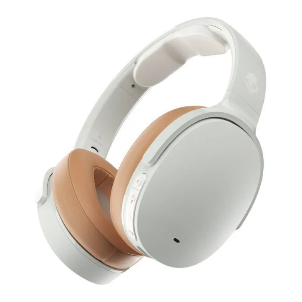 White over-ear wireless headphones with cushioned beige ear pads