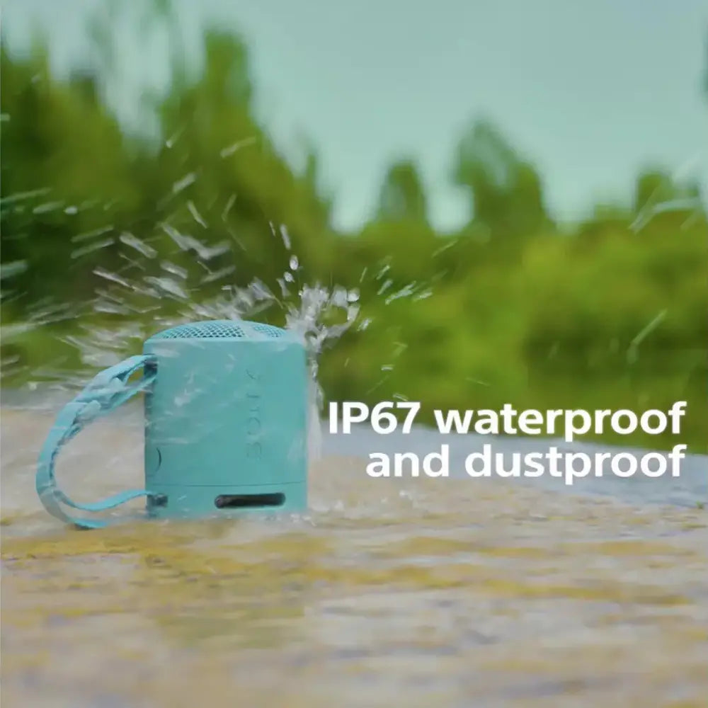 Sony SRS-XB100 portable Bluetooth speaker, light blue, floating on water
