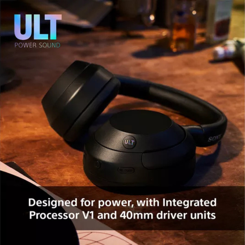 Black over-ear wireless headphones shown resting on a surface