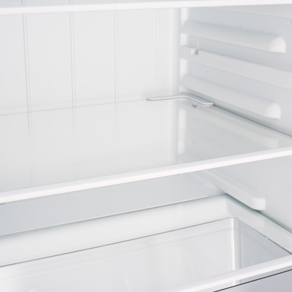 White fridge interior showing side rails and multiple shelves.