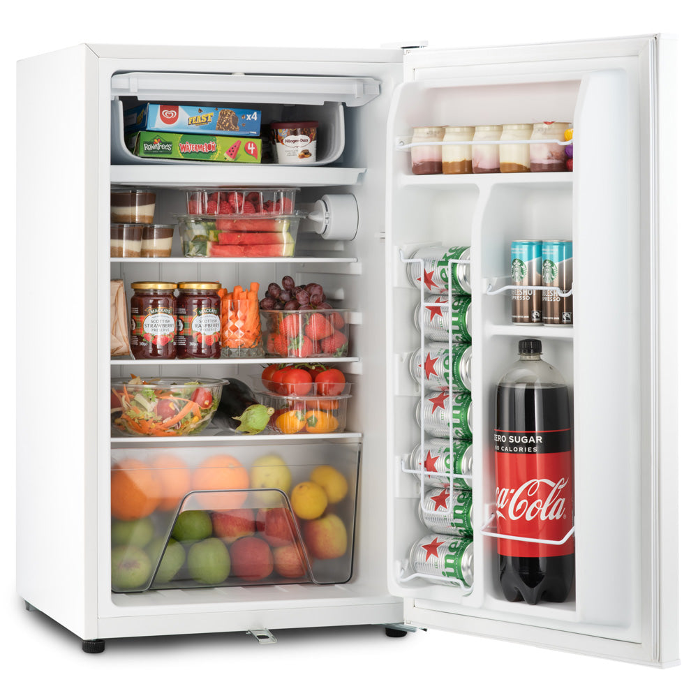 Under-counter LED fridge interior with multiple shelves and stocked drinks and jars