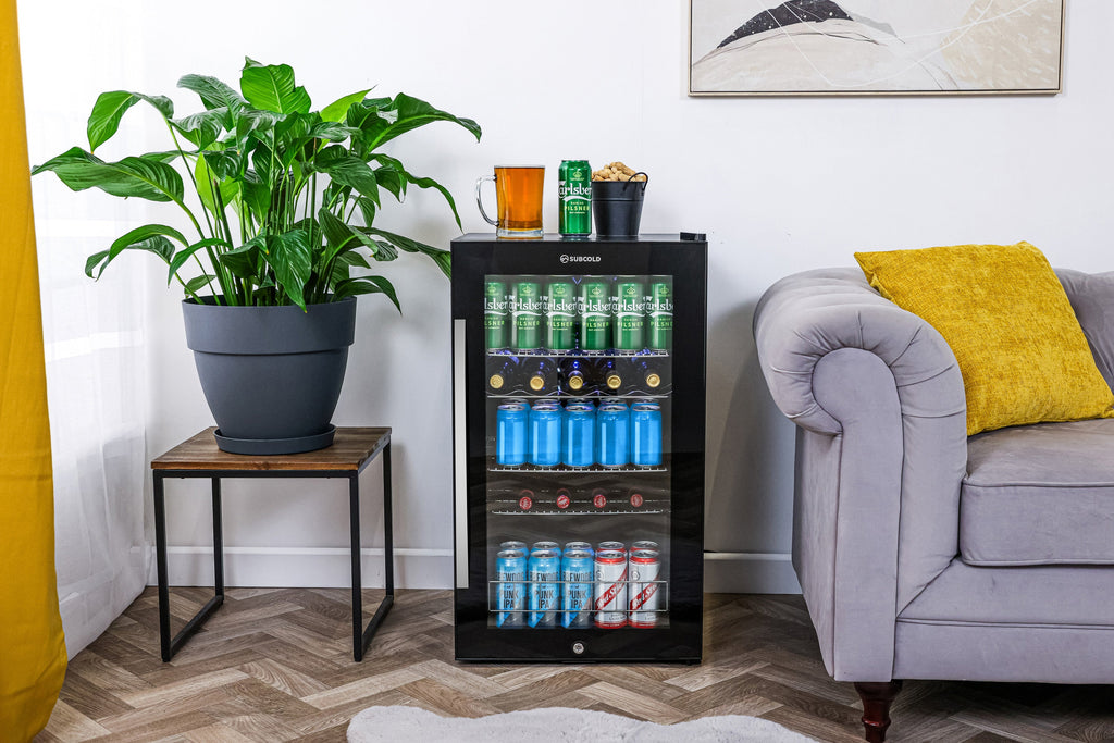 Black Subcold beer fridge with glass door and LED-lit interior shelves