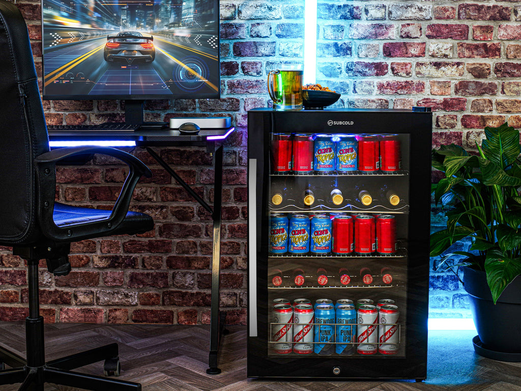 LED beer fridge with glass door, interior shelves showing assorted drink cans