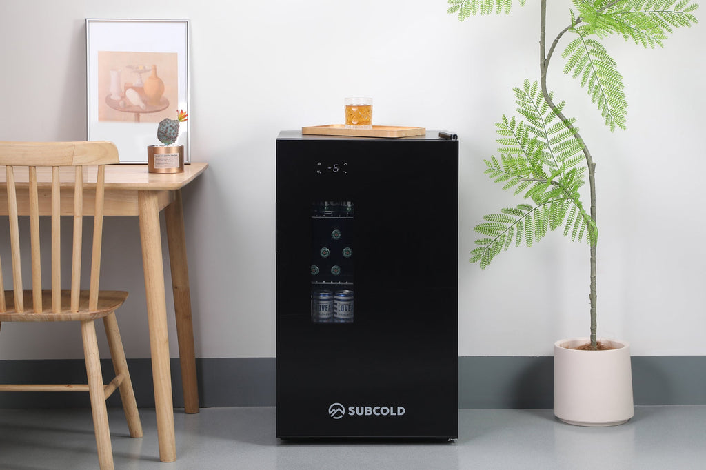 Black mini fridge with front control panel and SUBCOOL logo