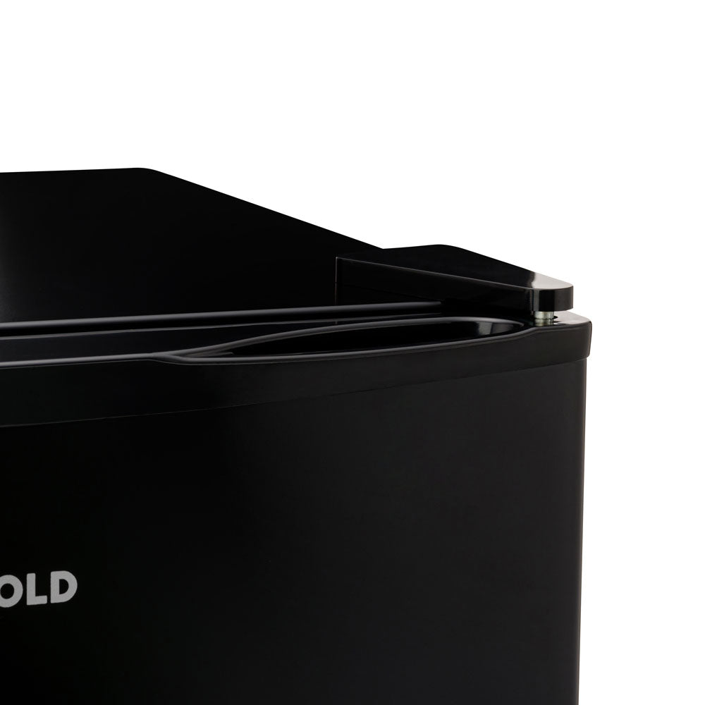 Black solid-door beer fridge top and handle detail with curved door edge