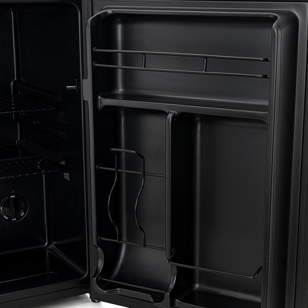 Open black beer fridge door with internal shelves and bottle organizer