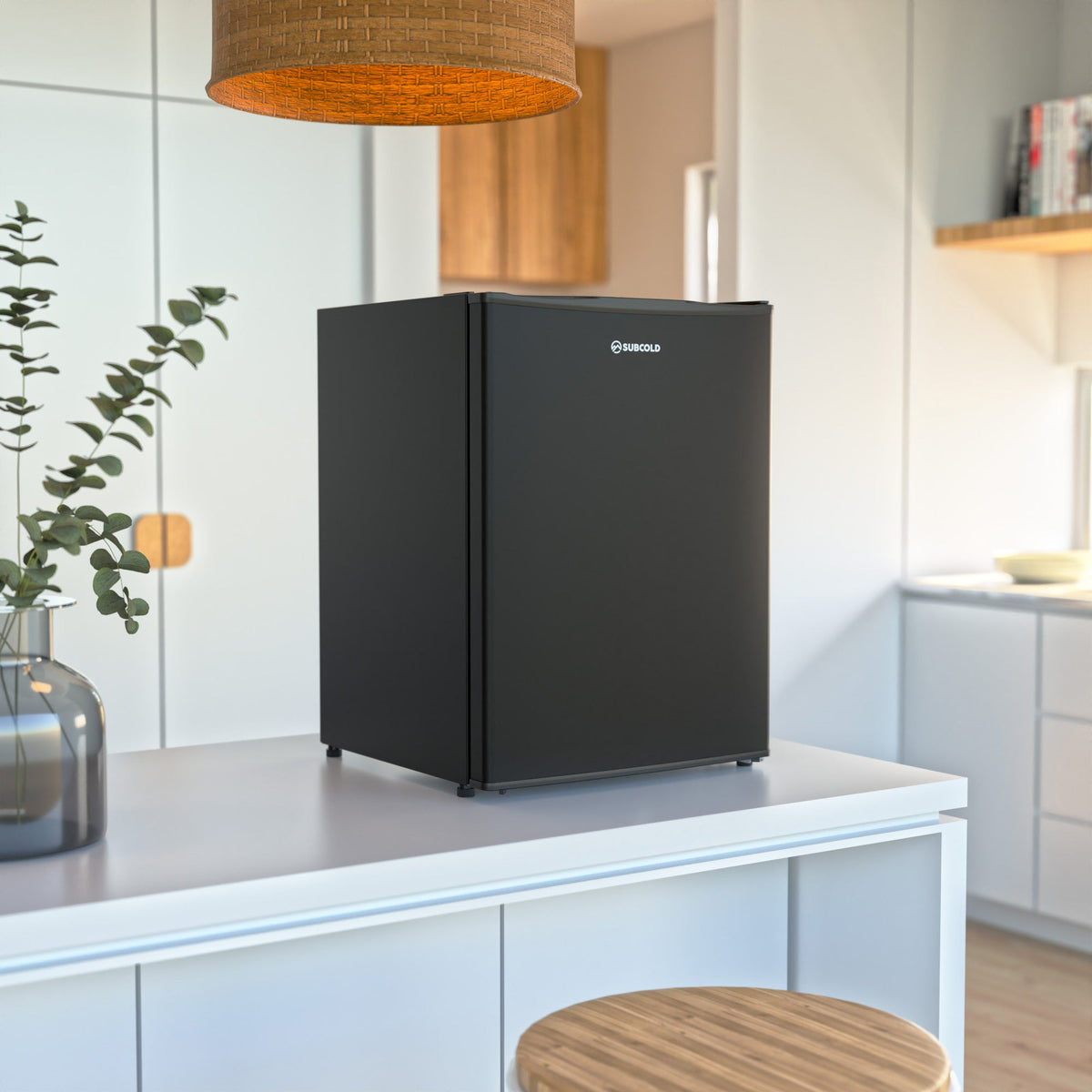 Black solid-door beer fridge with Subcold logo, freestanding cabinet